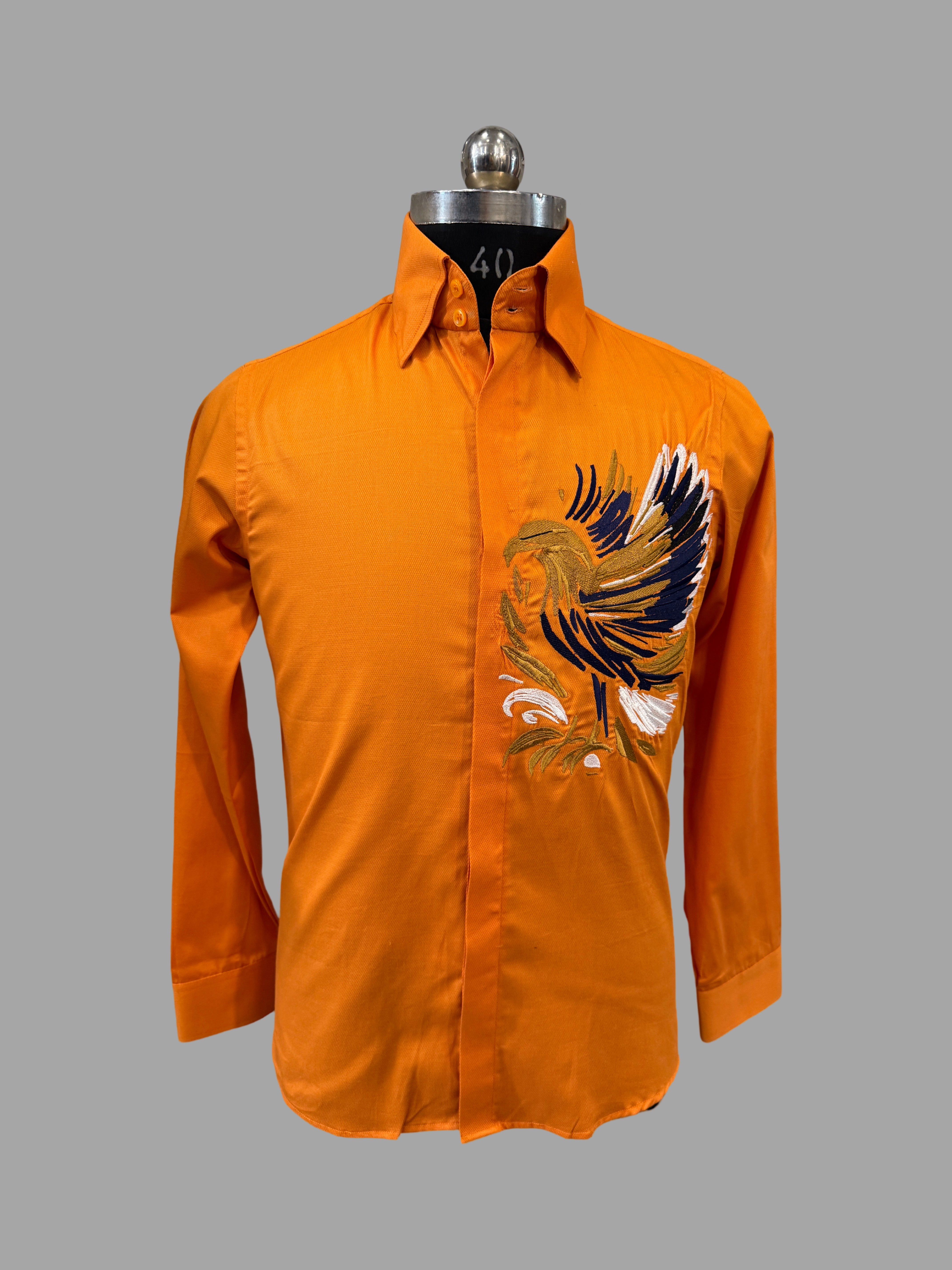Bird in Orange Shirt